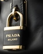 Re-Nylon and Leather Small Top-Handle Bag With Padlock - Image 5
