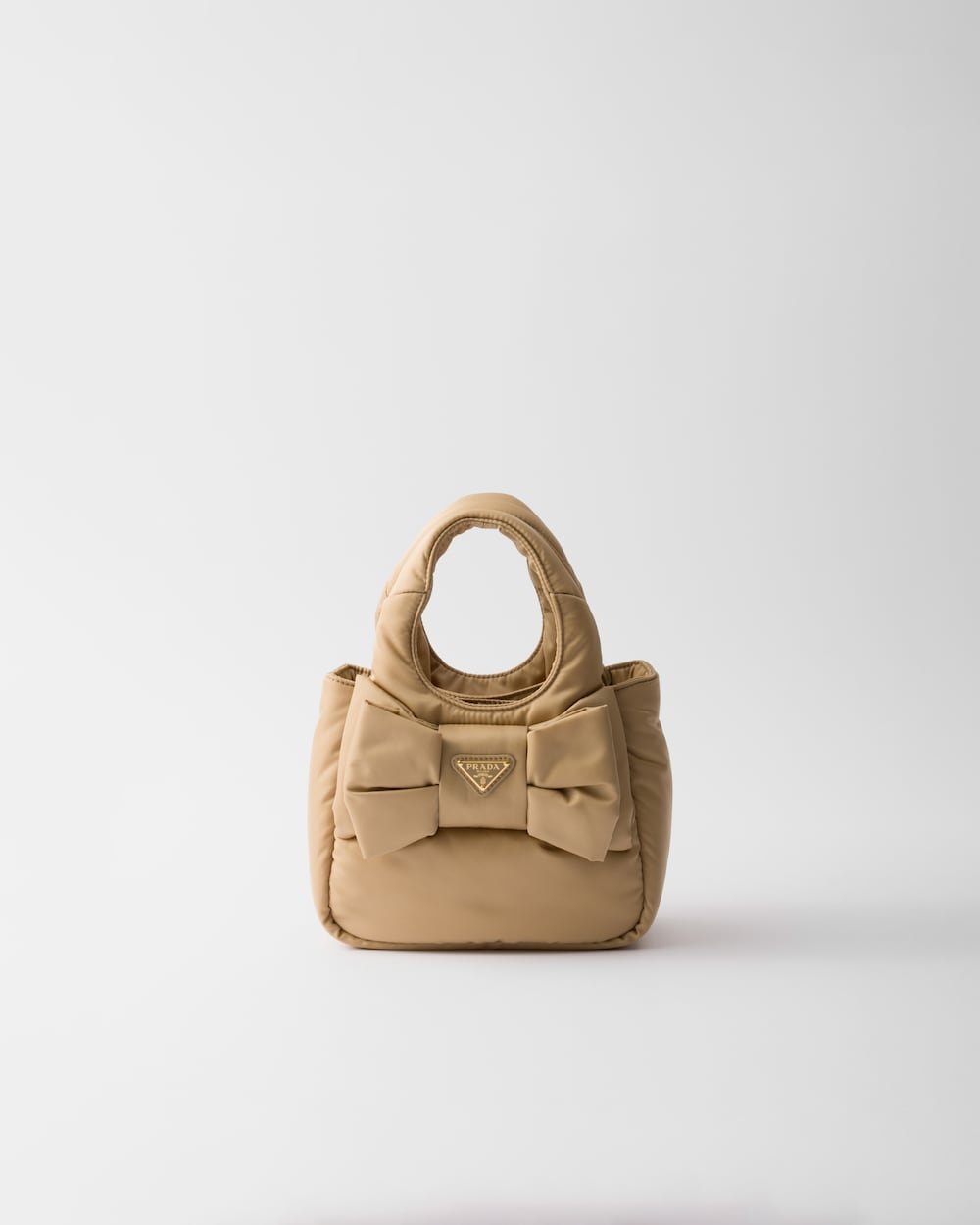 1978ce0f864b4d5ab42f6fceab58a72a.jpg Padded Re-Nylon Mini-Bag With Bow - Image 1