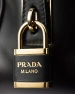 Re-Nylon and Leather Medium Top-Handle Bag With Padlock - Image 3
