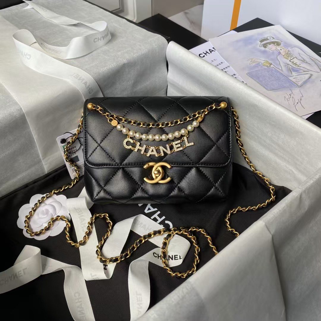 c1f00d83c38c41cb8b850565368200f9.jpg Chanel AS4986 Mini Flap bag Shiny Lambskin Imitation Pearls & Gold-Tone Metal Black - Image 1
