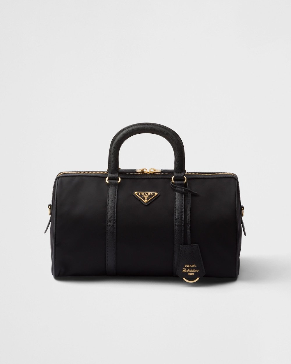 c9cfd858563040b48f0d4594647629bd.jpg Prada Re-Edition 1978 Medium Re-Nylon and Saffiano Leather Top-Handle Bag - Image 1